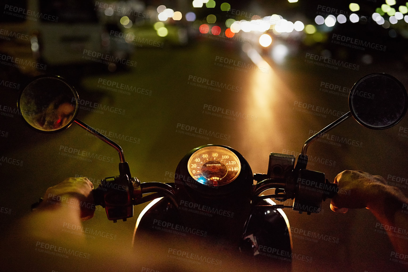 Buy stock photo POV shot of a man riding a motorbike at night