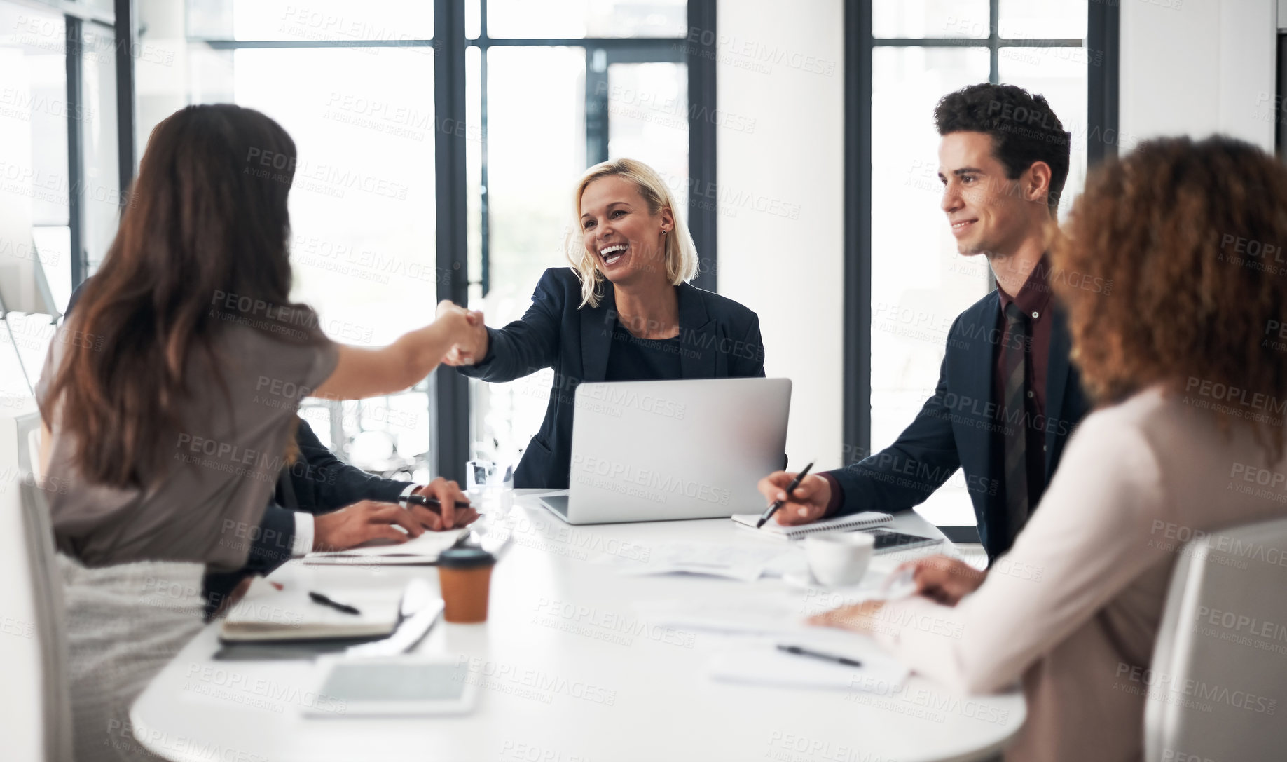 Buy stock photo Business people, handshake and meeting for hiring, partnership or collaboration at office conference. Happy woman shaking hands with employee in recruiting, team growth or agreement deal at workplace