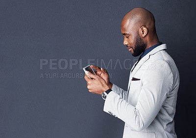 Buy stock photo Tablet, reading and business man isolated on dark gray background, mockup and stock market research or sales. Accountant or african person in finance search or scroll on digital tech on a banner wall