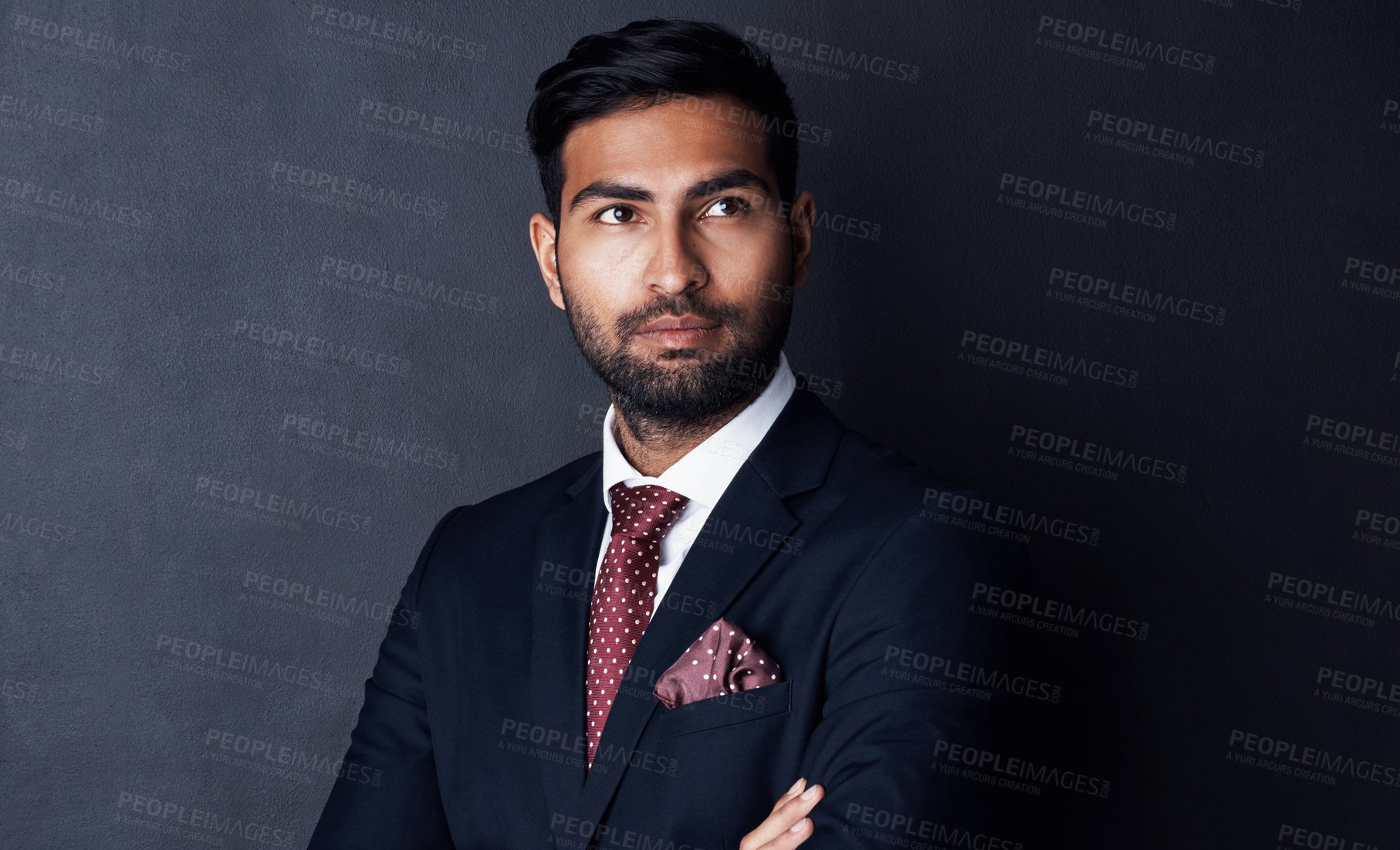 Buy stock photo Studio shot of a businessman looking thoughtful against a gray background
