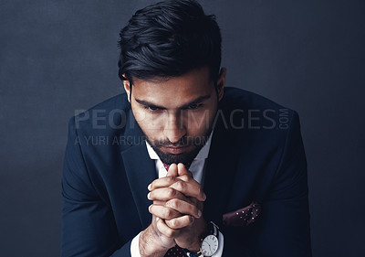 Buy stock photo Entrepreneur, thinking or Indian man with stress, depression and challenge on a dark studio background. Male person, bankruptcy or agent confused, mistake or professional with worry, decision or fail