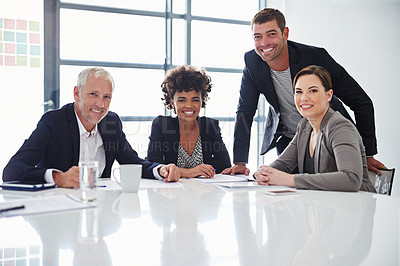 Buy stock photo Cropped portrait of a group of businesspeople meeting in the boardroom