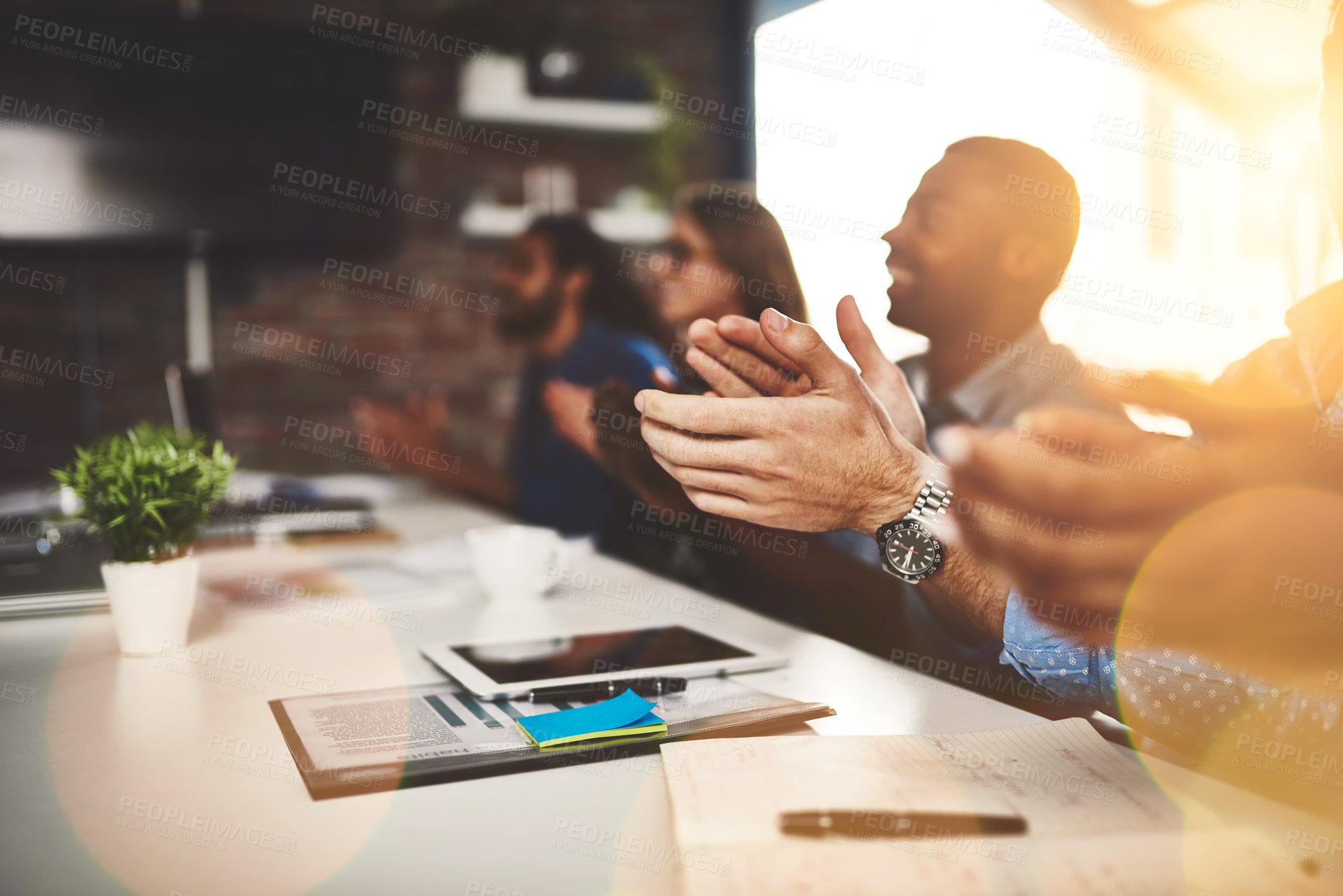 Buy stock photo Meeting, celebration and presentation for coworkers, boardroom and lens flare in office. Seminar, conference and clap for creative agency people, diverse and employees for discussion in workshop