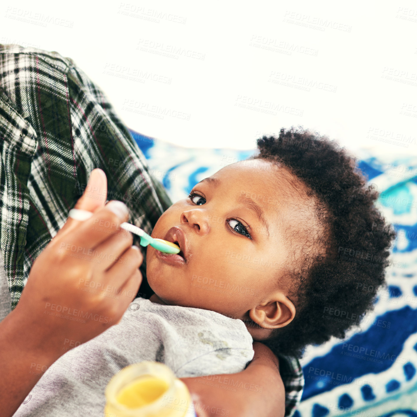 Buy stock photo Parent, baby and portrait in home with feeding for nutrition, vitamins and growth for child development. Black people, kid and toddler with meal for bonding or care, support and trust with smile