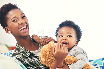 Buy stock photo Smile, mother and child laughing with teddy bear in apartment for comedy, humor or joking together. Black family, comic or love with woman parent and funny kid bonding in living room of home