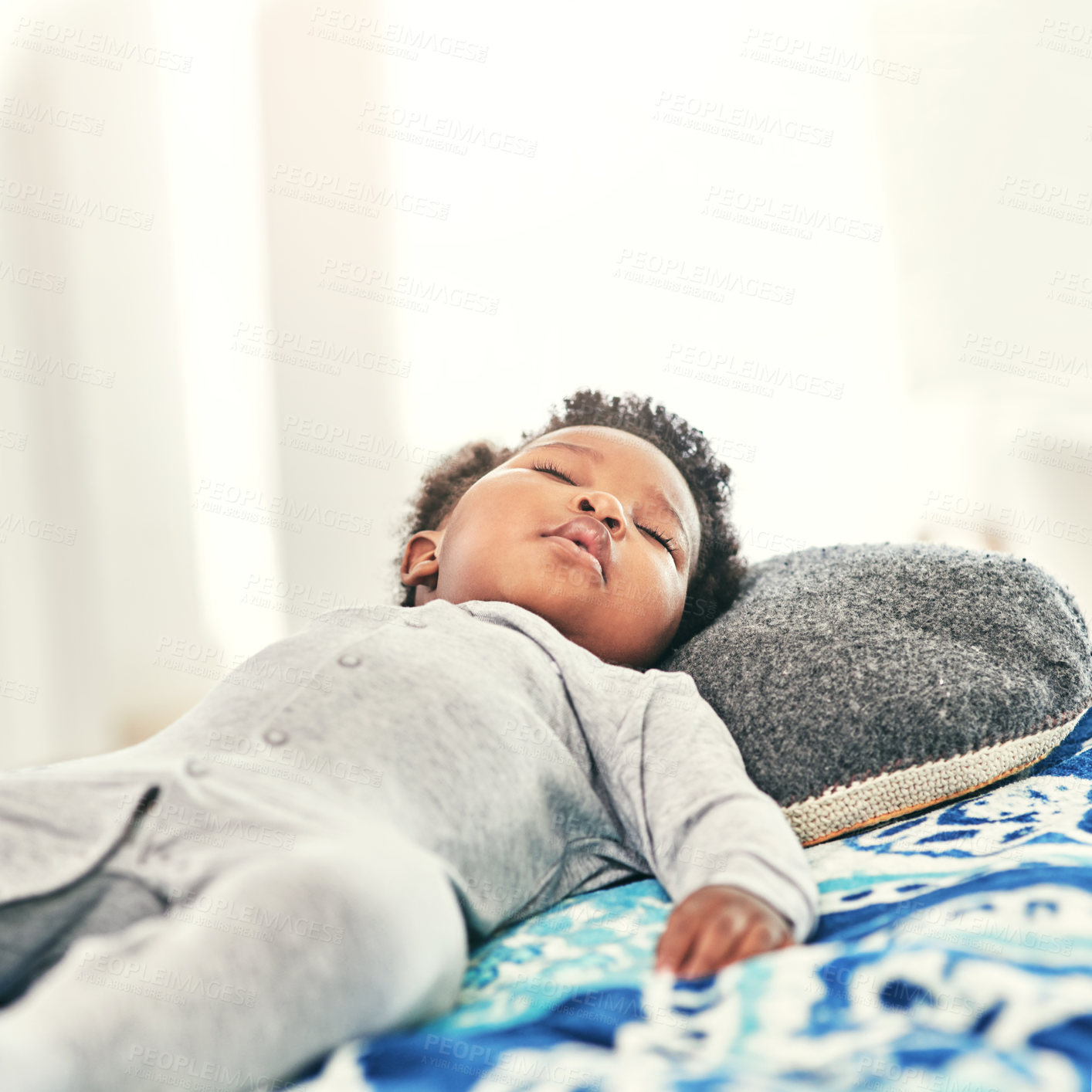 Buy stock photo Infant, sleeping and black child on bed in nursery room for resting, tired or development. Baby, relax and sweet newborn kid lying in bedroom for comfortable, morning nap or dreaming in home