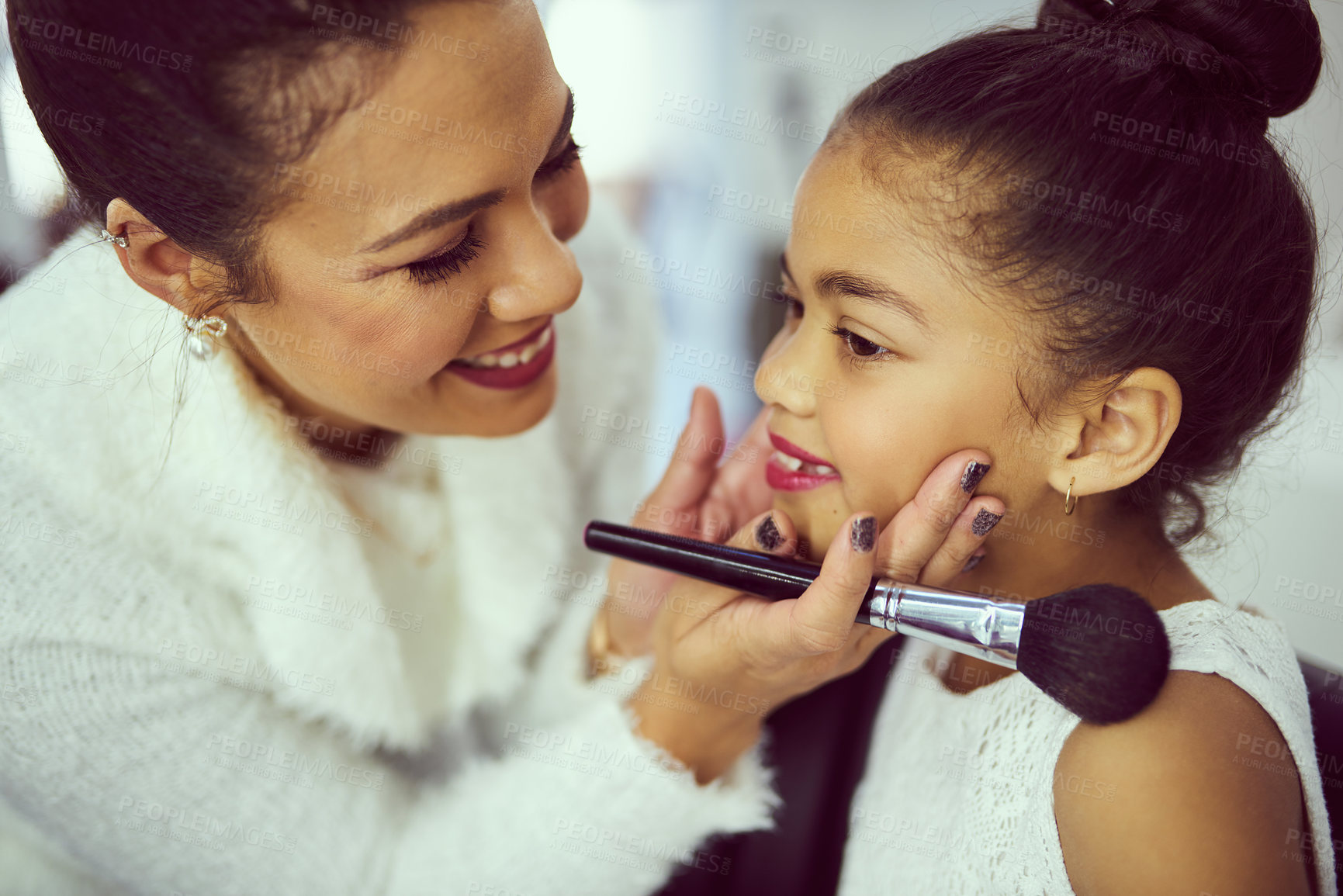 Buy stock photo Backstage, celebrity or makeup brush with girl and stylist in studio, getting ready behind the scenes. Blush, child model and cosmetics with happy woman on set for creative preparation of talent