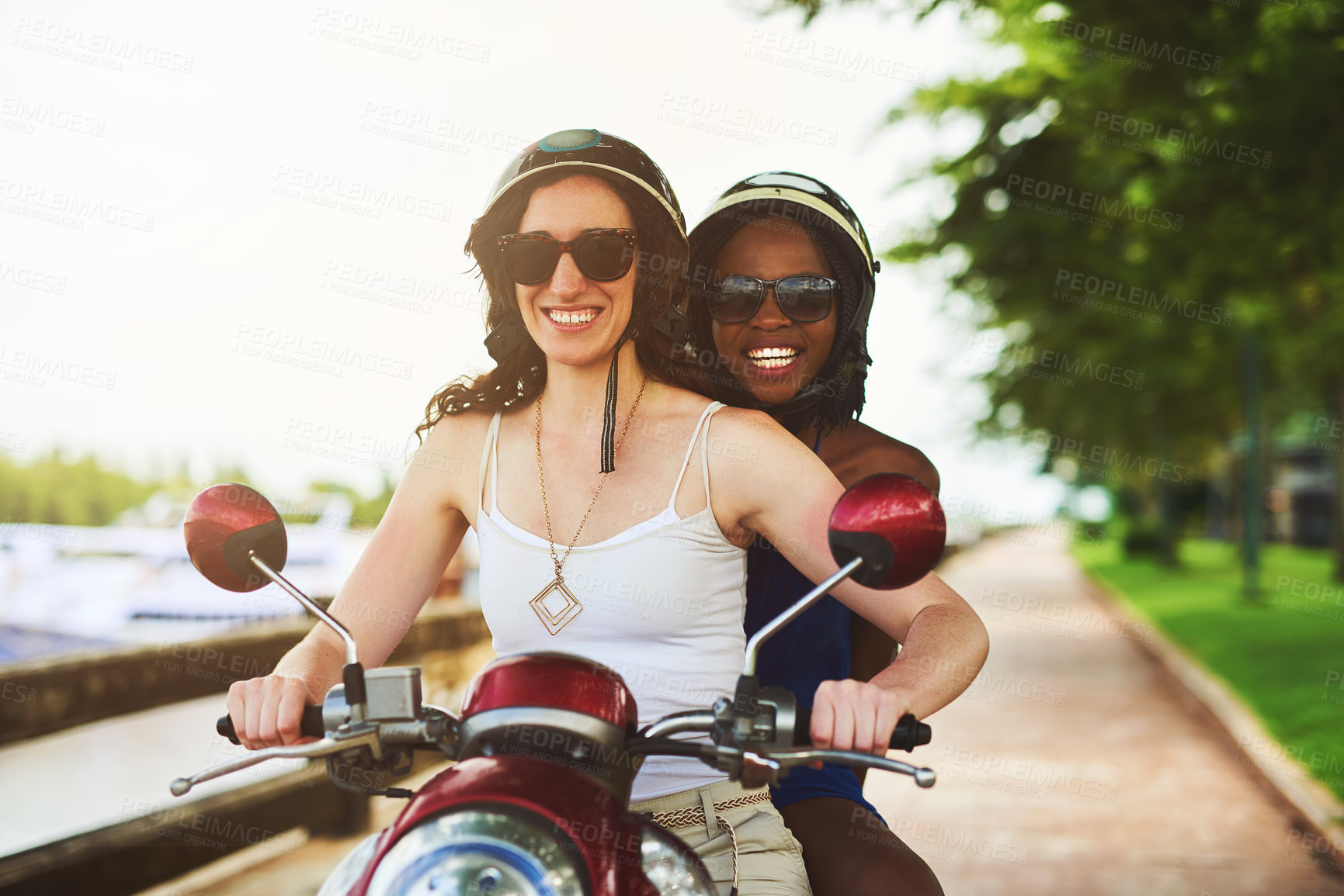Buy stock photo Motor scooter, female couple and smile outside with trip for fun in summer on vacation or holiday. Diverse, lesbian and lgbtq with women in nature or tourist in France with cheerful and sunshine.