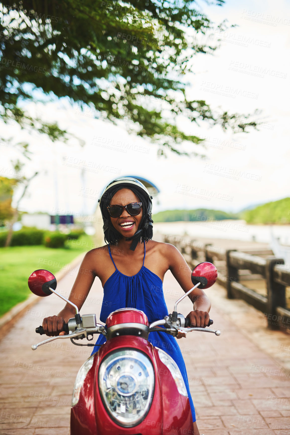 Buy stock photo Black woman, motor scooter and smile outside with helmet for fun in summer on holiday with happiness. Joy, vehicle and travel with vacation in nature with tourist in France, cheerful and sunshine