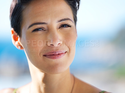 Buy stock photo Portrait of an attractive young woman standing outside