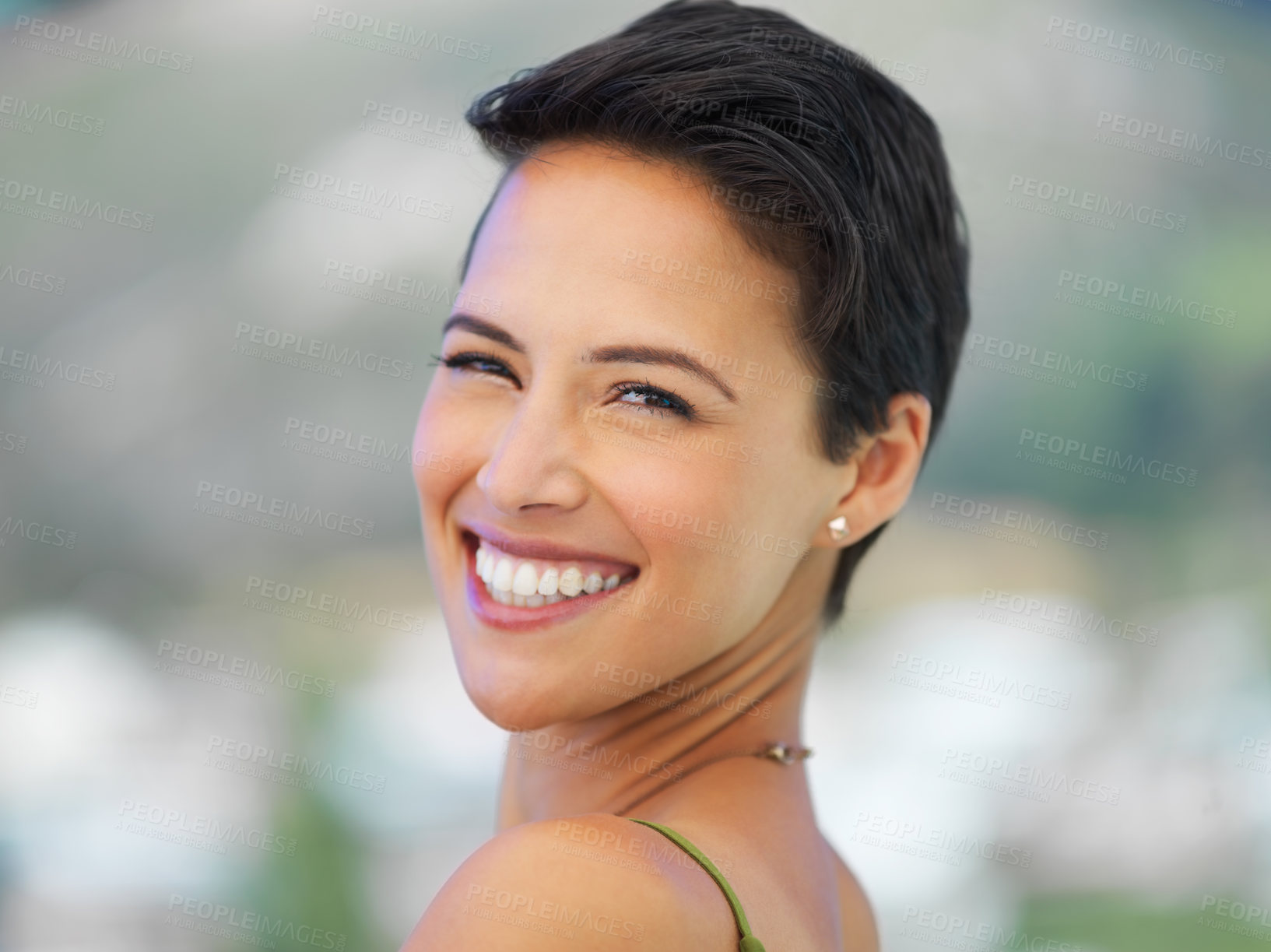 Buy stock photo Portrait of an attractive young woman standing outside