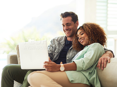 Buy stock photo Happy, internet and interracial couple with laptop for watching online video and streaming movie in living room. Smile, black woman and man with computer for social media app and subscription service