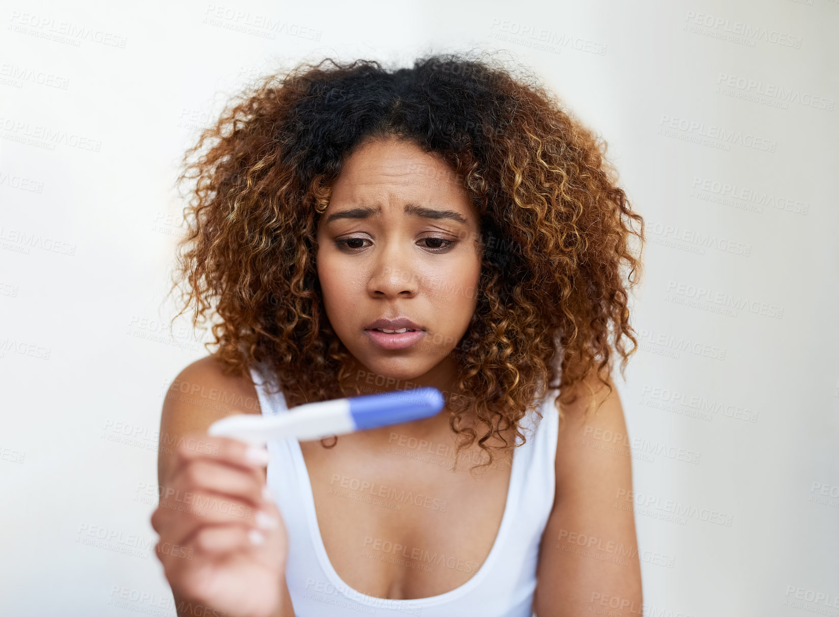 Buy stock photo Black woman, anxiety and fear in house with pregnancy test for baby, infertility and future family. Girl, stress and scared with testing kit in home for motherhood, child and ivf results by mockup