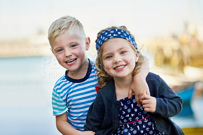 Buy stock photo Portrait of a cute little brother and sister posing together on a day out