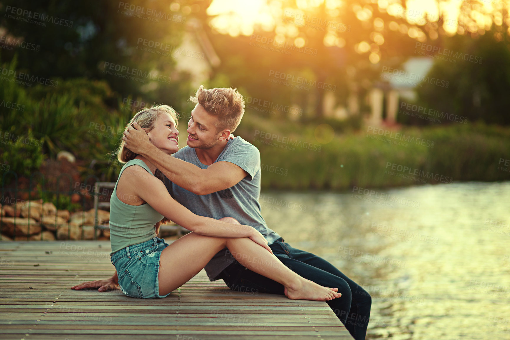 Buy stock photo Love relationship, smile and couple by pier with lake, support together and weekend break for outdoor date. happy woman, man and romantic holiday by river with trust and vacation adventure in Florida