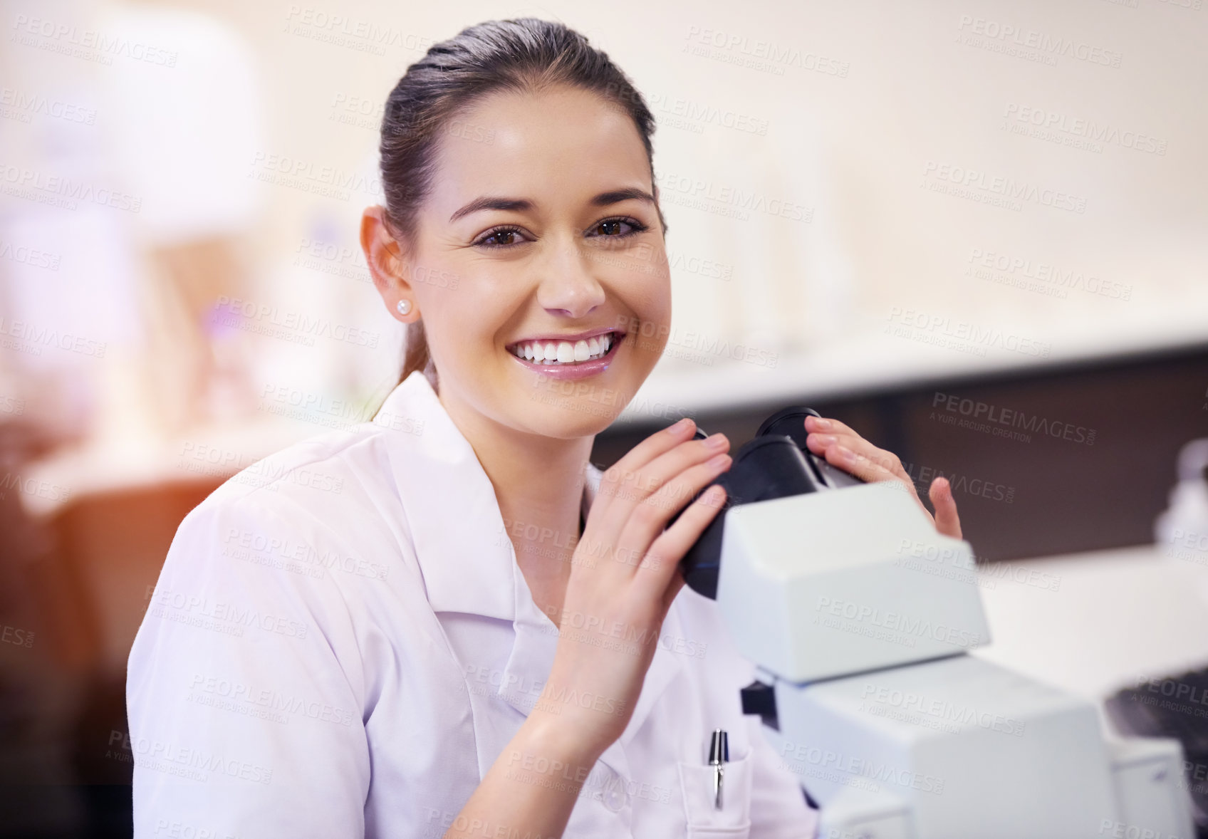 Buy stock photo Girl, portrait and scientist in laboratory with microscope for medical samples to diagnose disease and chemistry. Woman, happy and lab equipment for science experiment or pharmaceutical research test