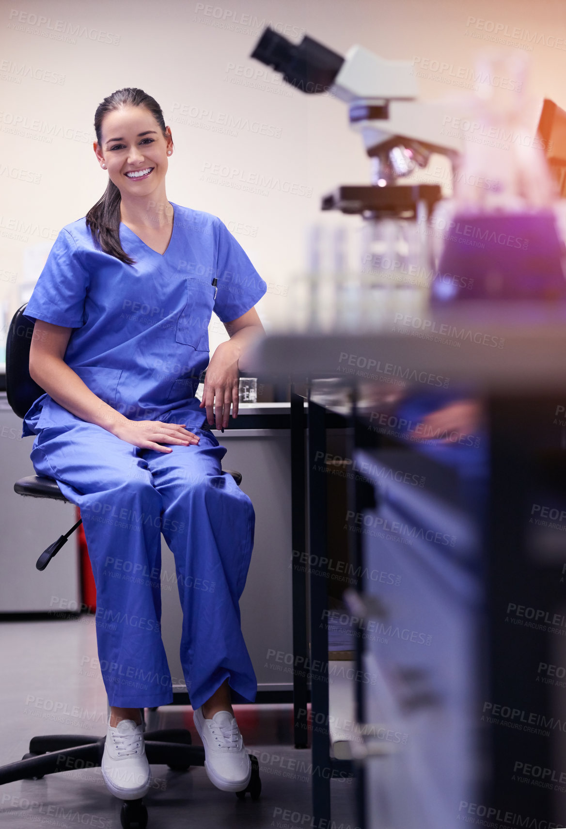 Buy stock photo Girl, scientist and portrait smile in laboratory for medical research, clinical trial and microscope for biomedical study. Female pharmaceutical worker, biotechnology and proud for experimental test.