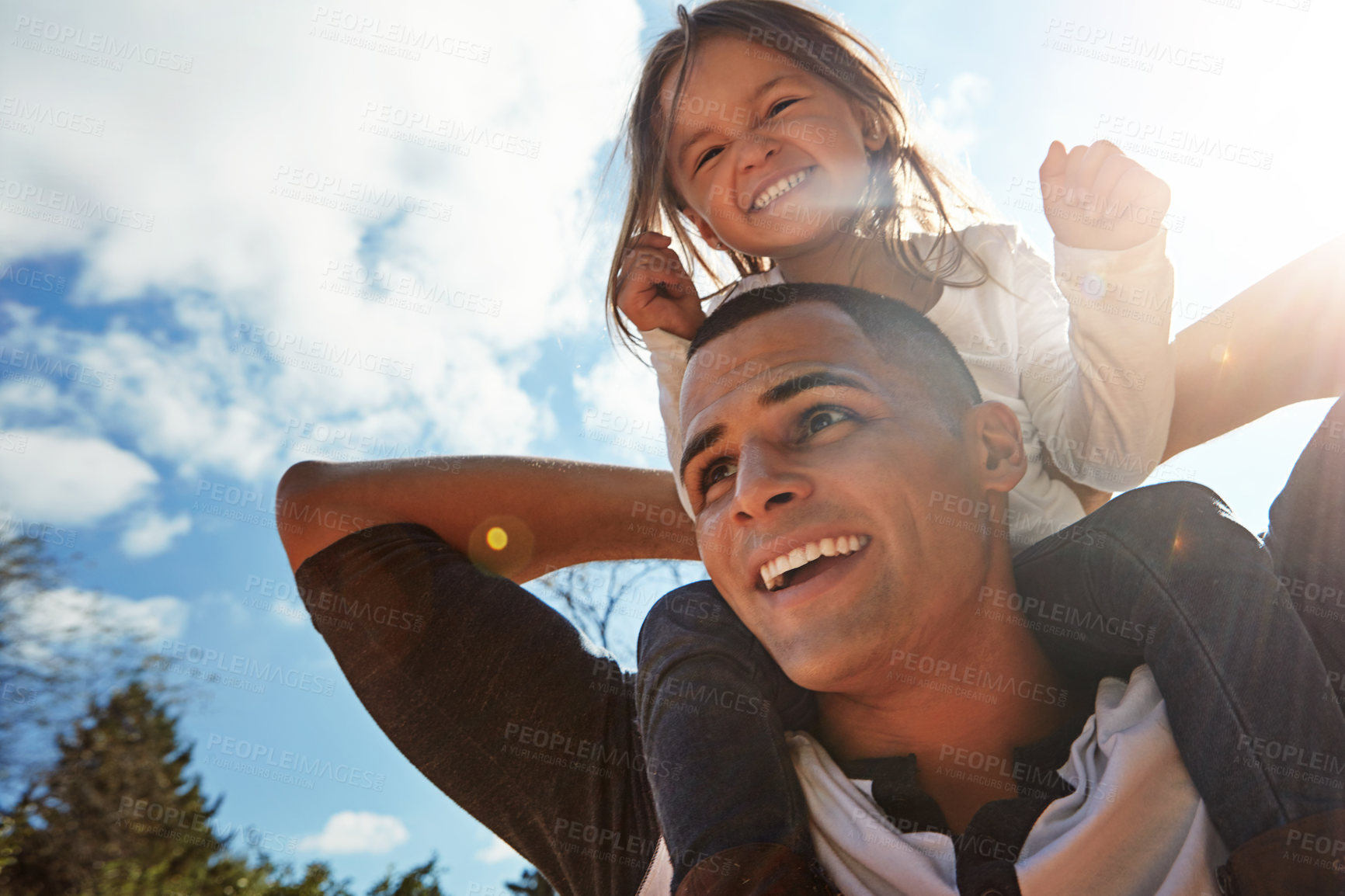 Buy stock photo Sky, smile and man with girl on shoulder in nature for outdoor bonding, support and child development. Happy, playful and low angle of dad with kid for fun adventure, love and care on fathers day