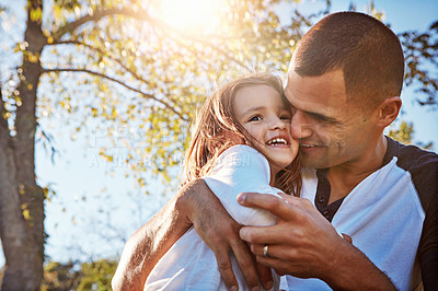 Buy stock photo Happy, child and hug from dad in garden, park or relax on adventure in summer, vacation or holiday. Father, love and care for girl and embrace on travel in countryside or environment with family