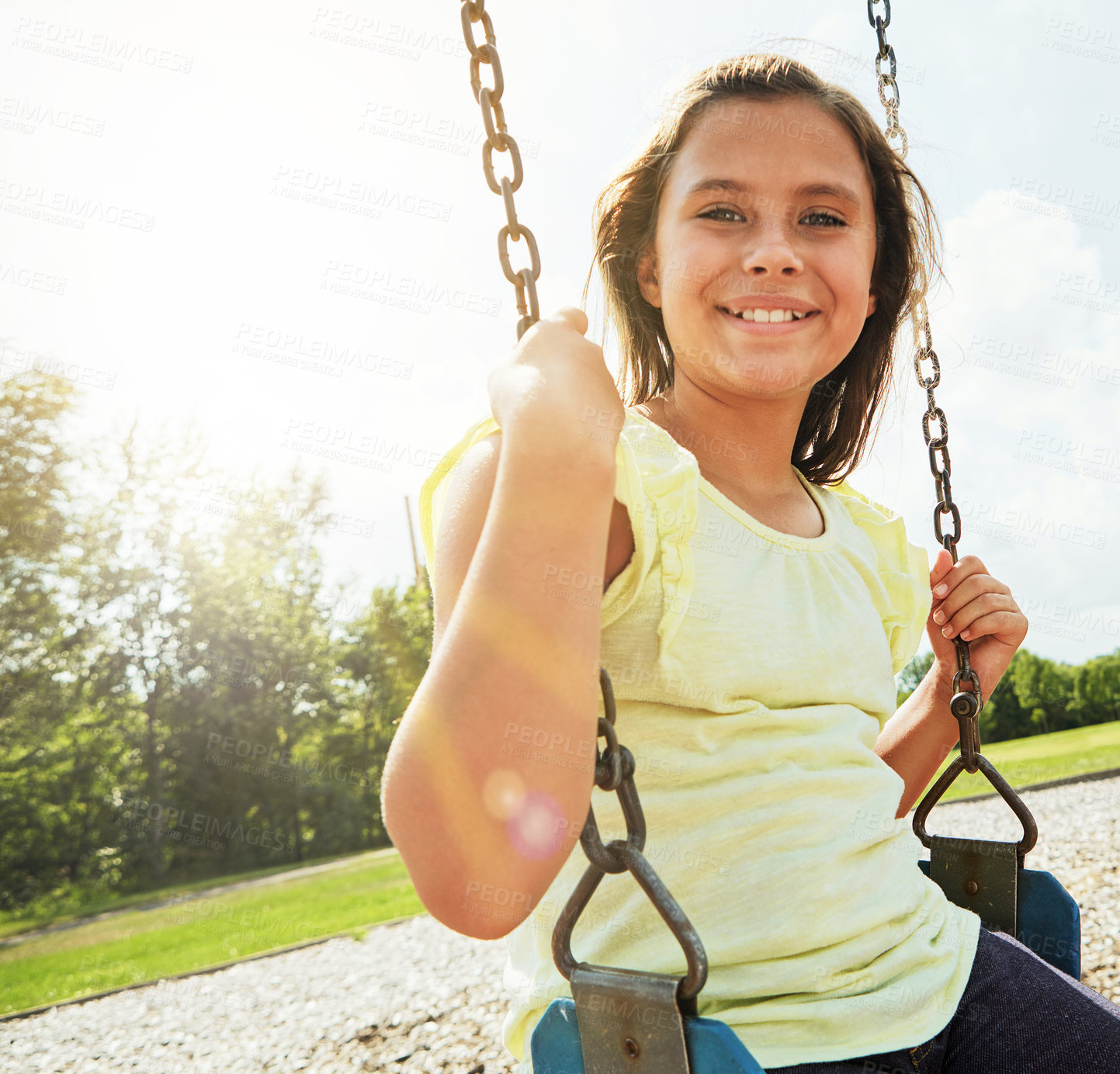 Buy stock photo Girl, portrait and smile with playground, swing and nature for outdoor fun and play with fresh air. Child, tree and park with summer, freedom and school holiday or break outside with happiness