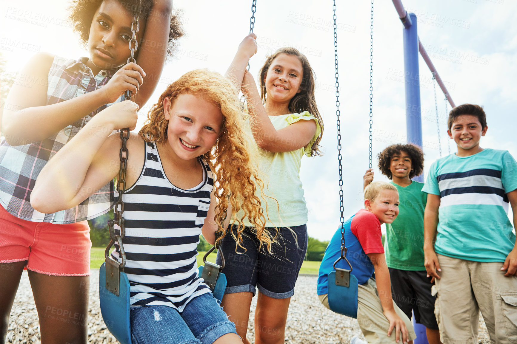 Buy stock photo Portrait, children or kids in park outdoor playing together for friendship, bonding and relationship development. Happy, young people and swing on jungle gym for childhood fun or summer break