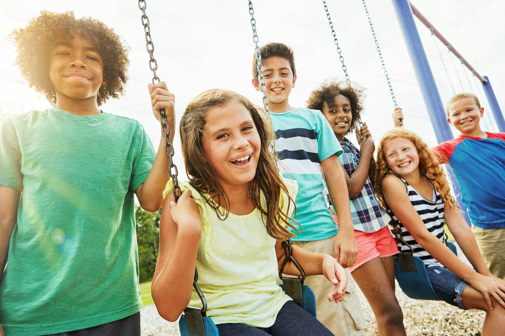 Buy stock photo Children, playground and portrait with group of friends outdoor together for bonding or development. Break, fun and swing with happy kids at park in summer for growth, holiday or relationship