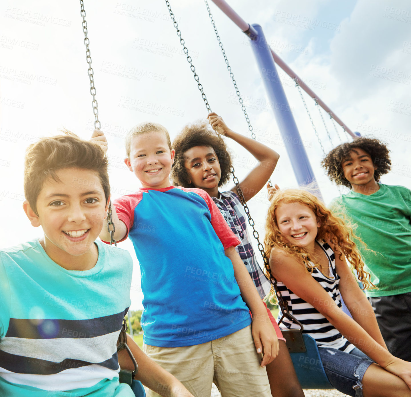 Buy stock photo Portrait of a group of young children playing together at the park