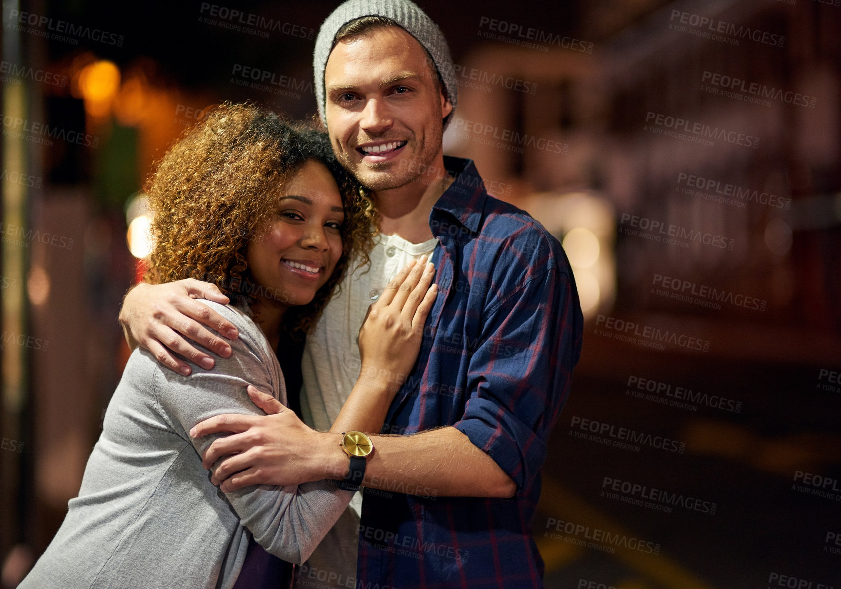 Buy stock photo Cropped shot of a young couple out on a date in the city