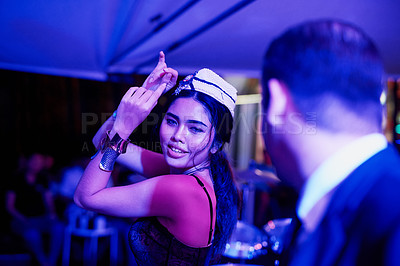 Buy stock photo Shot of a seedy businessman watching a woman dancing in a Thai nightclub