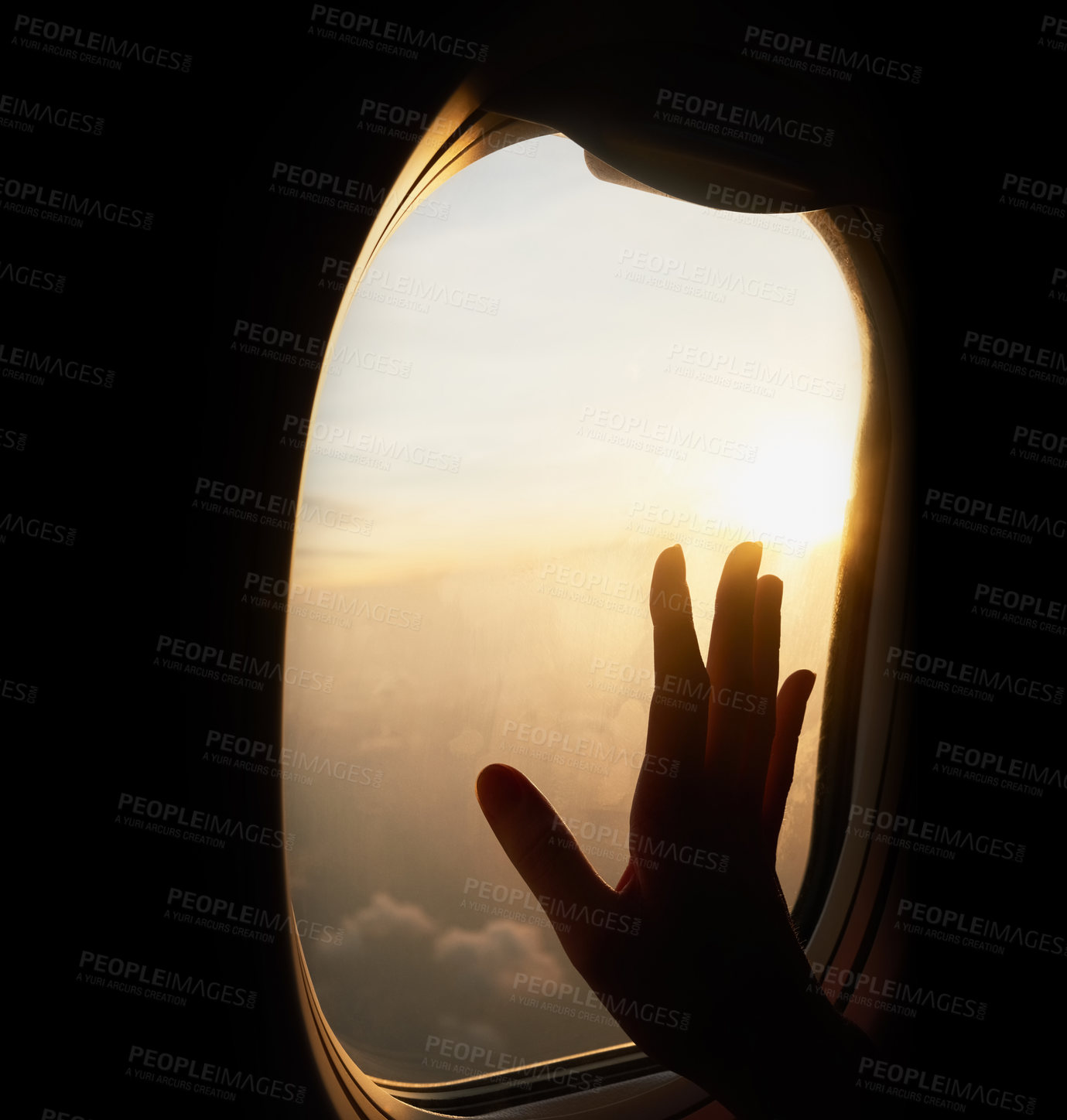 Buy stock photo Shot of an unrecognizable person's hand up against the window of a plane