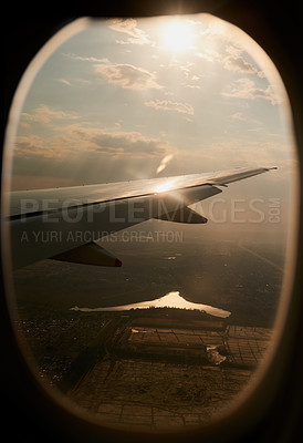 Buy stock photo Shot of the view through an airplane window