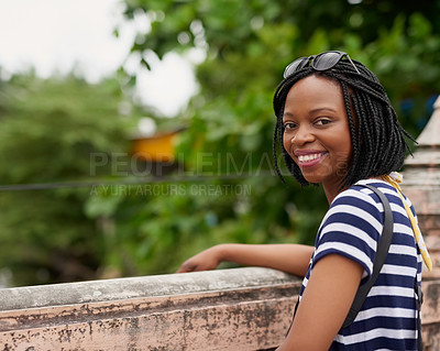 Buy stock photo Portrait of a happy young woman admiring the view while on vacation