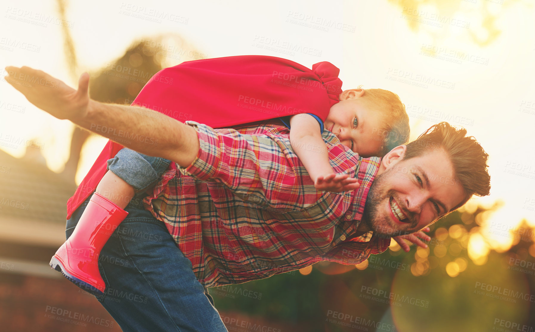 Buy stock photo Child, man and piggyback for airplane in portrait for fun, fantasy or development in garden. Young boy, father or playing outside in evening for flying, entertainment or games in backyard for bonding