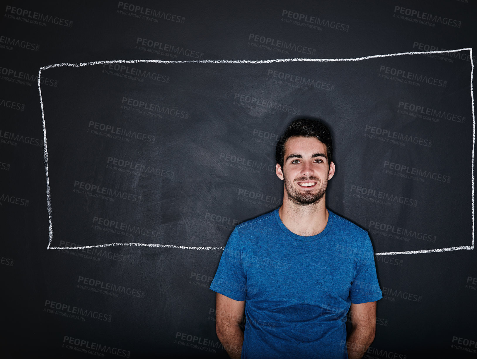 Buy stock photo Studio portrait of a fit young man posing with a chalk illustration of a box against a dark background