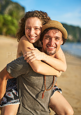 Buy stock photo Happy couple, piggyback and portrait on beach for love, travel and vacation on tropical island. Man, woman and together by ocean for holiday, tourism and adventure in sunshine on seaside in summer