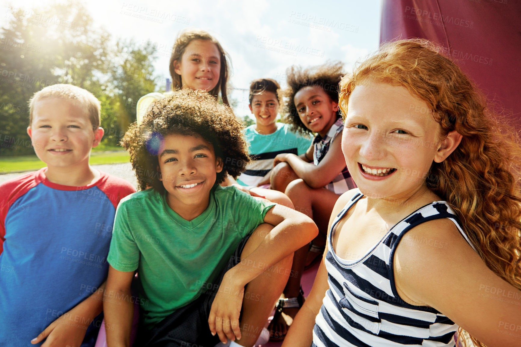 Buy stock photo Kids, group and portrait on playground in park to relax with friends in summer on vacation. Happy, holiday and children together for camp, games or smile outdoor at middle school recess or break