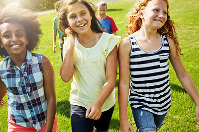 Buy stock photo Portrait of a group of diverse and happy kids hanging out together outside