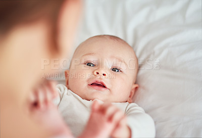 Buy stock photo Cropped shot of a mother bonding with her adorable baby boy at home