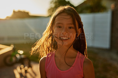 Buy stock photo Children, portrait and girl in backyard for sunset games, learning or having fun on vacation, break or holiday. Smile, face or happy kid in Indonesia with summer, adventure and development in garden