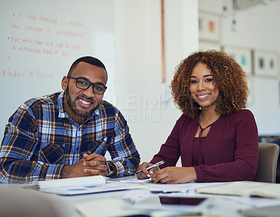 Buy stock photo Portrait of two young designers working together in an office