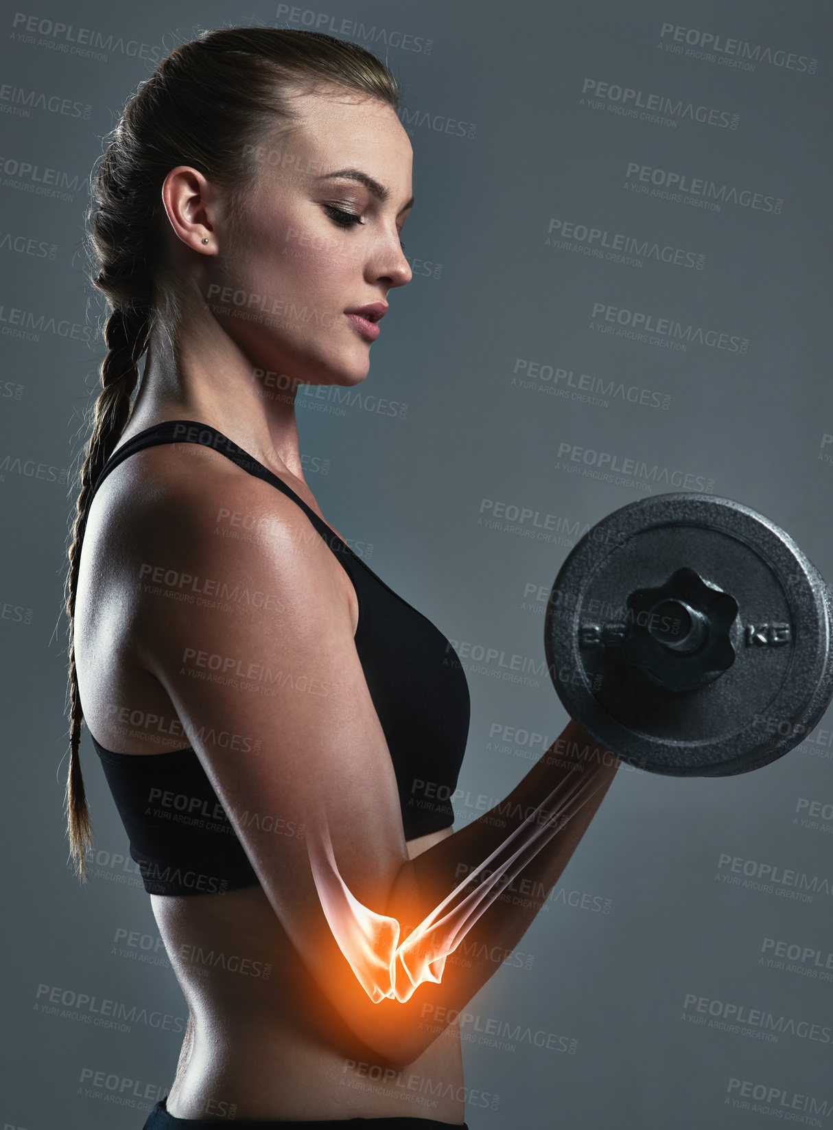 Buy stock photo Woman, weights and x ray in studio for bodybuilding, anatomy and wellness or body care. Sports scientist, workout and red glow for muscle, growth or recovery and injury prevention by dark background