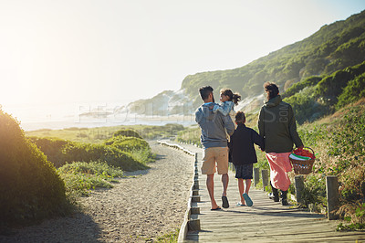 Buy stock photo Shot of a family of four spending the day outdoors