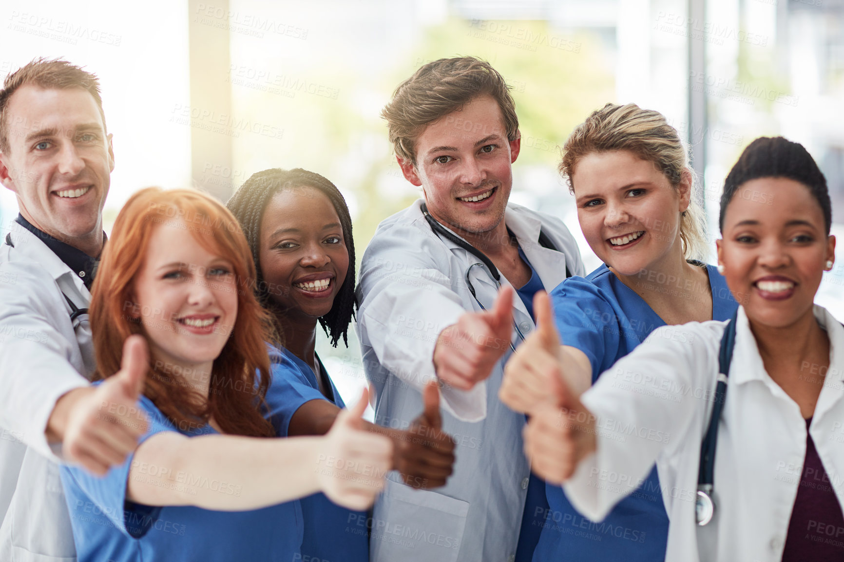Buy stock photo Happy people, portrait and medical team with thumbs up for success, good job or well done at hospital. Group of healthcare employees with smile, like emoji or yes sign for winning together at clinic