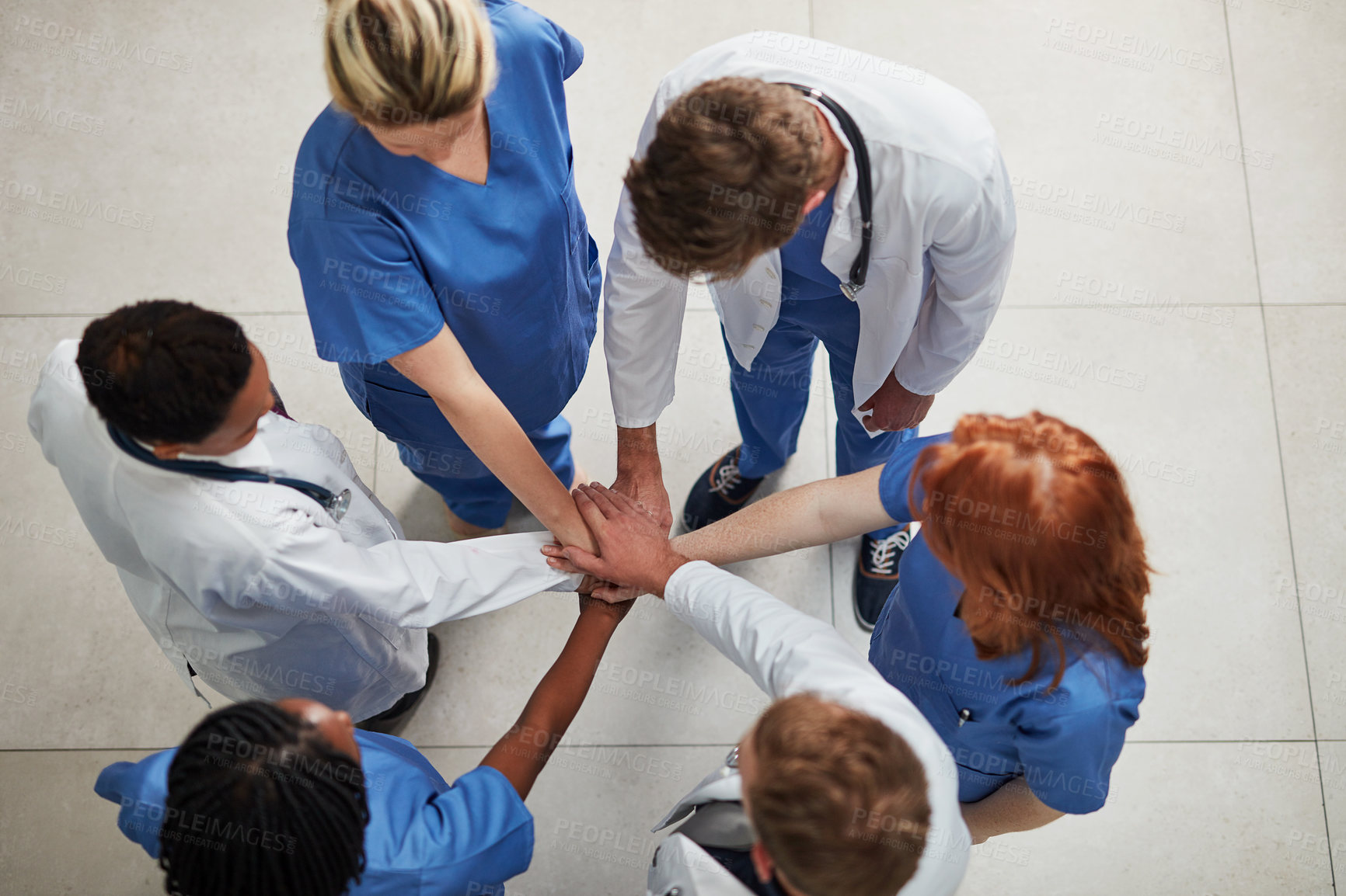 Buy stock photo Top view, teamwork or hands of doctors in stack with mission in collaboration for healthcare support. Hospital clinic, people or group of medical nurses with solidarity, motivation or community help