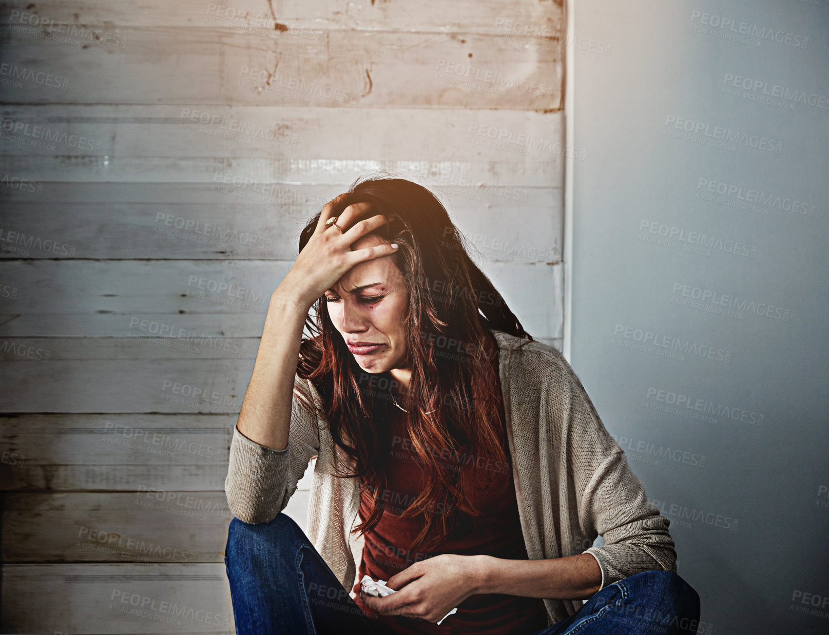 Buy stock photo Bruise, crying and sad woman with stress in home, domestic violence abuse and trauma experience for crisis. Injured, scared and person with breakdown for despair, gbv victim and fear for safety