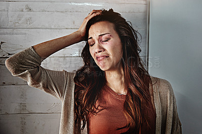 Buy stock photo Cropped shot of a beaten and bruised young woman