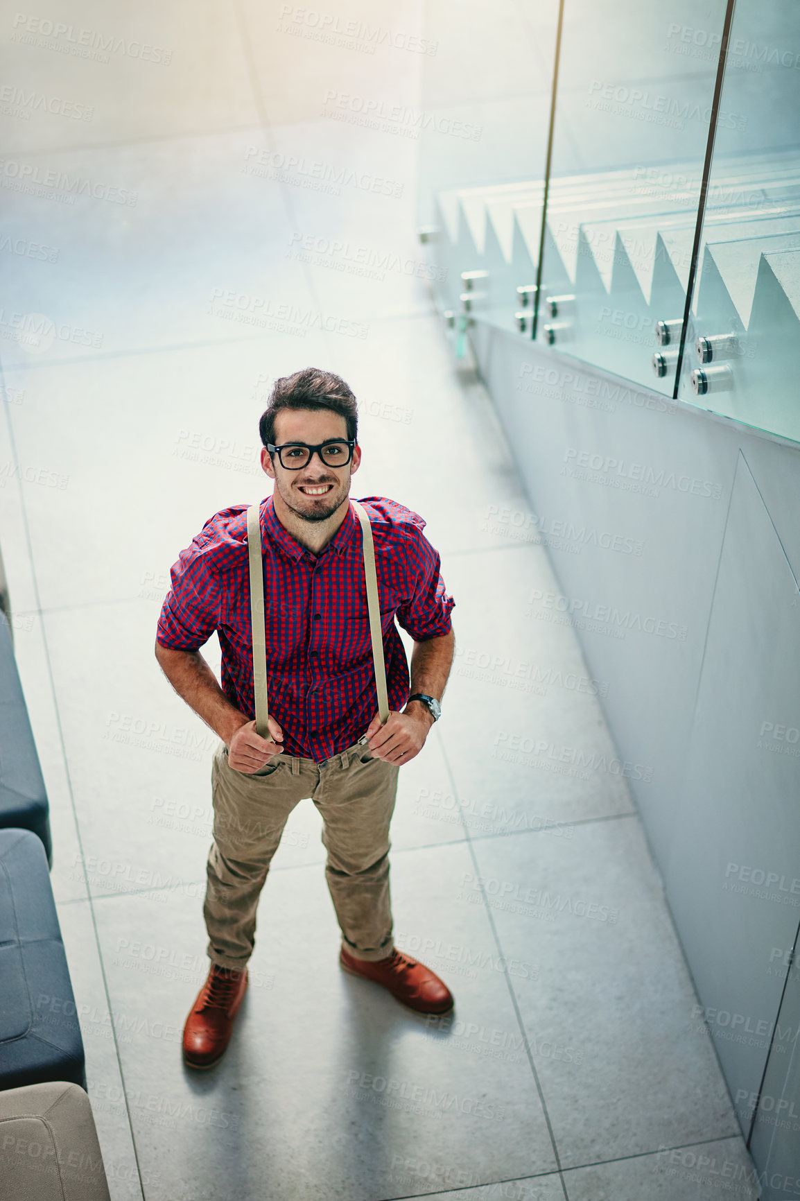 Buy stock photo High angle portrait of a handsome young designer standing in the office