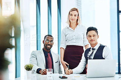 Buy stock photo Cropped portrait of three businesspeople working together in the office