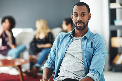 Buy stock photo Casual, cool and trendy businessman, marketing manager or entrepreneur at a team informal brainstorming meeting. Face portrait of a young and stylish man at a gathering with colleagues in background