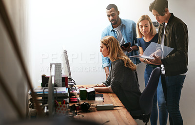 Buy stock photo Teamwork, talking and meeting group of marketing colleagues planning, brainstorming or discussing ideas. Diverse creative team collaborating with paperwork or reports to market global startup company